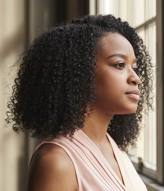 short natural black curly hairstyle