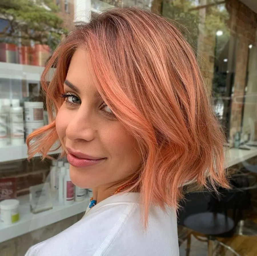 short pastel peach balayage hair