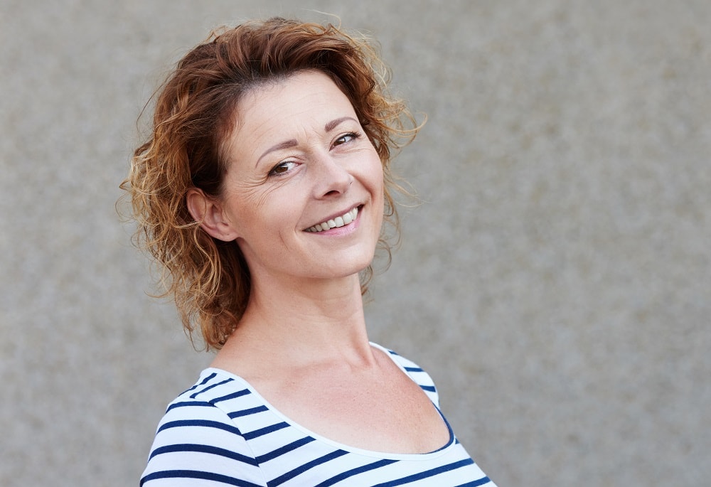 short permed hair for women over 50