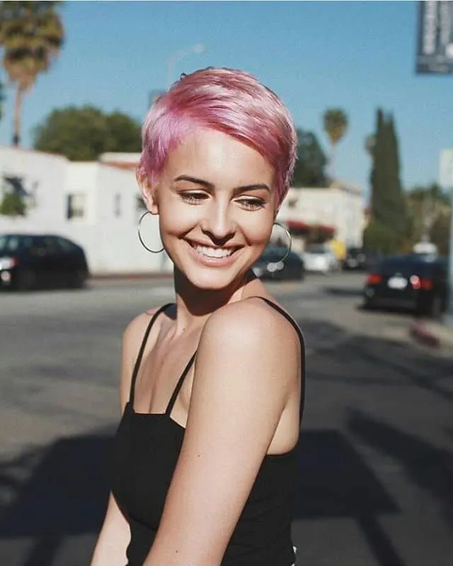 short-cropped pink hairstyle