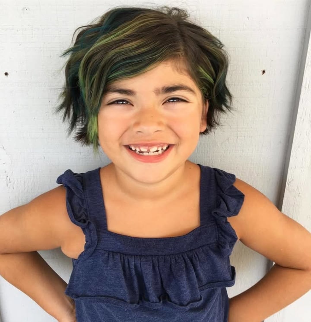 little girl wavy short pixie cut with side swept wavy bangs