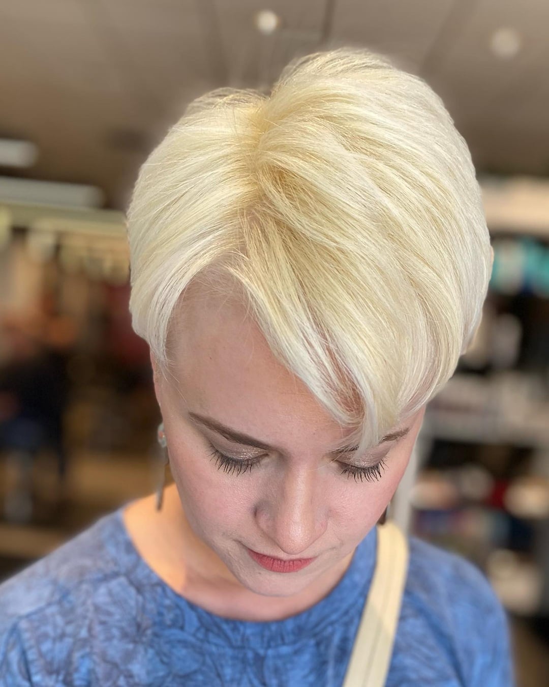 short blonde pixie cut with side part for fine hair