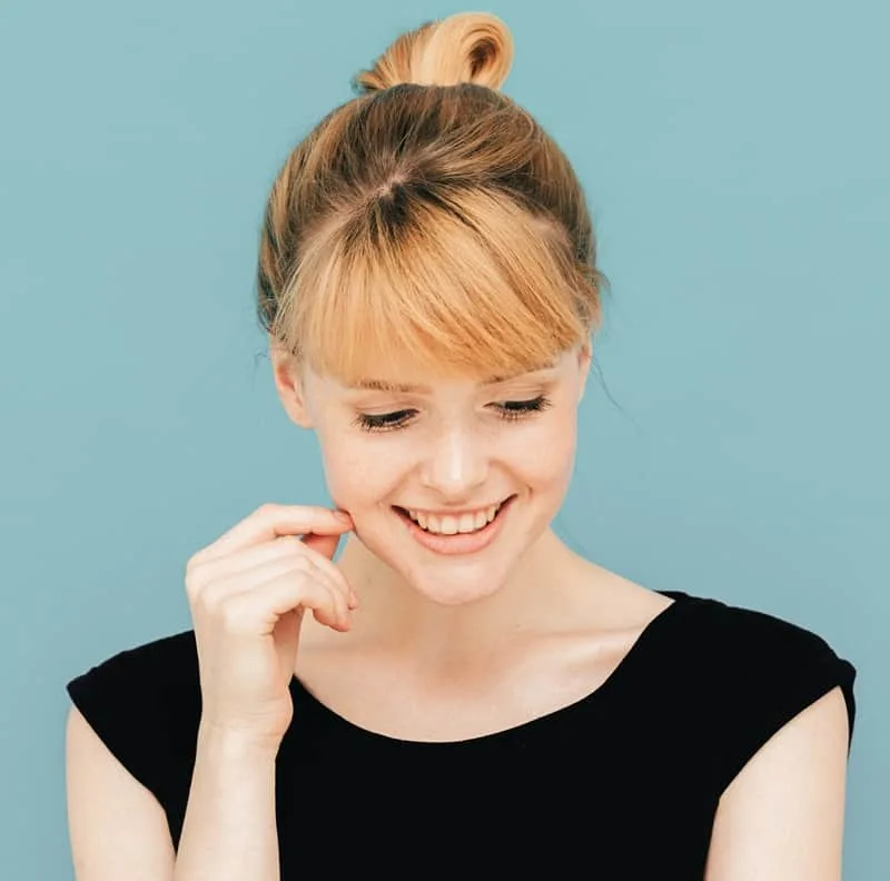 Short Ponytail With Bangs .webp