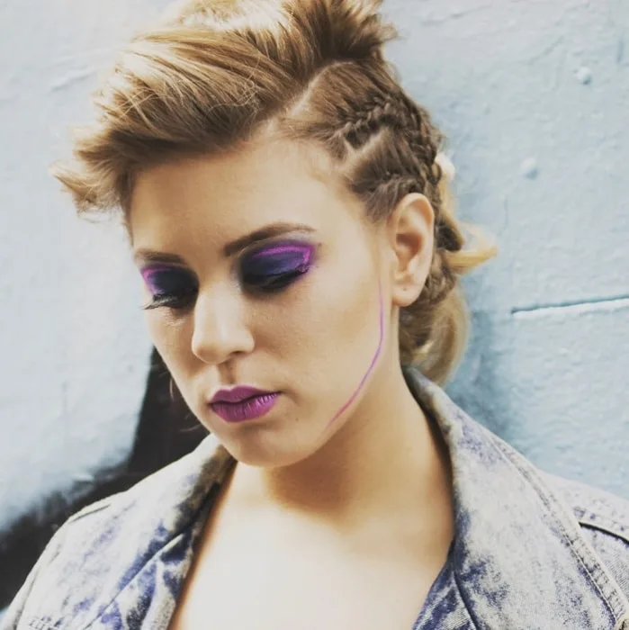 punk rock hairdo with undercut braids