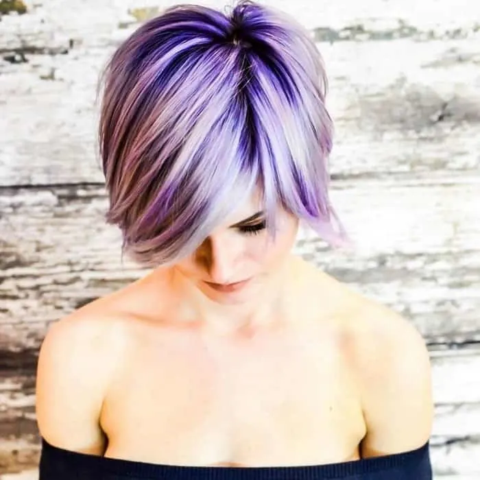 short purple balayage with a side part 