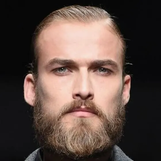 short slick back hairstyle with beard