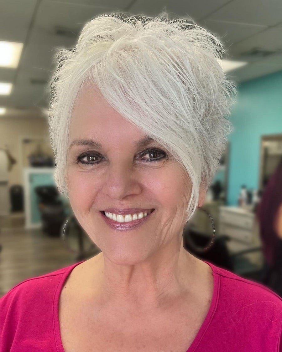 Short and spiky haircut over 70 with bangs