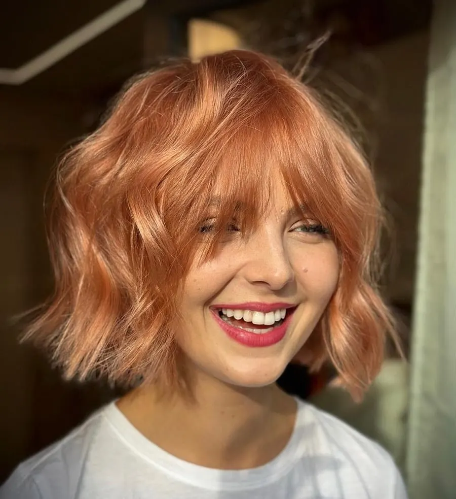 short strawberry blonde hair with bangs