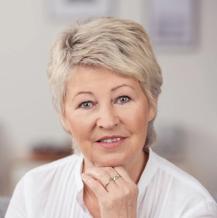 short thick hairstyle for women over 50 with oval faces