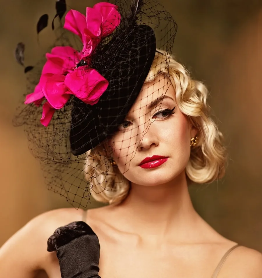 short vintage hairstyle with fascinator