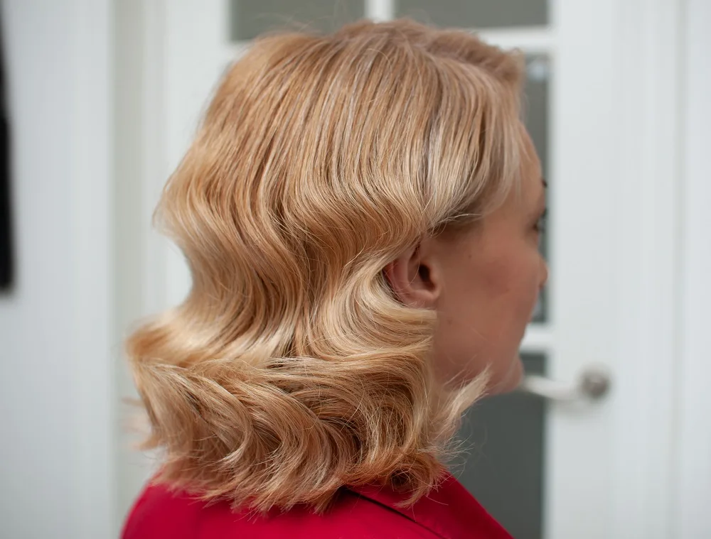 shoulder length golden blonde bob with hollywood waves