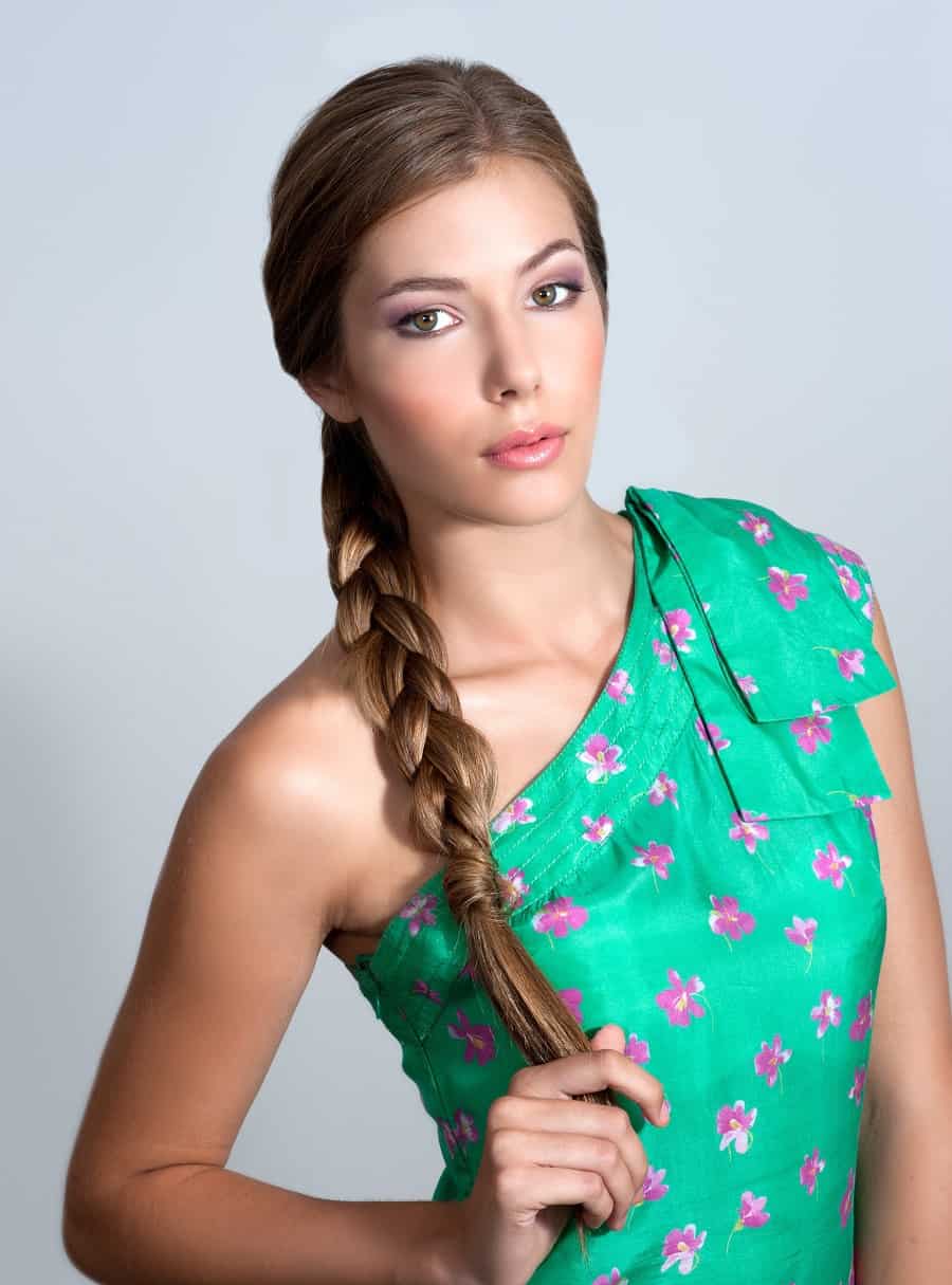 side braided hairstyle for one shoulder dress