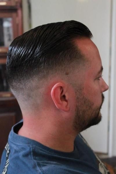 slicked back with side fade hair