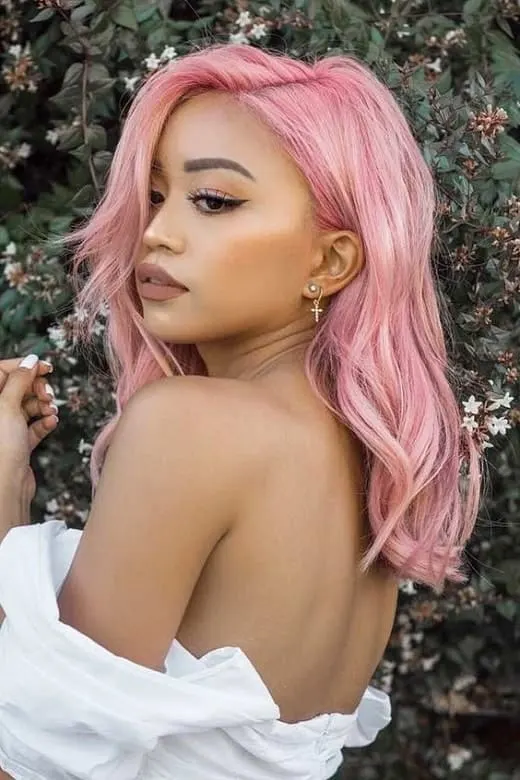 pastel pink hair with side bangs