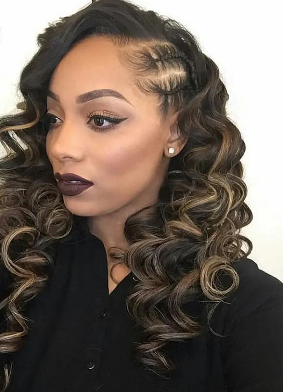 side part curly hairstyle with side braids