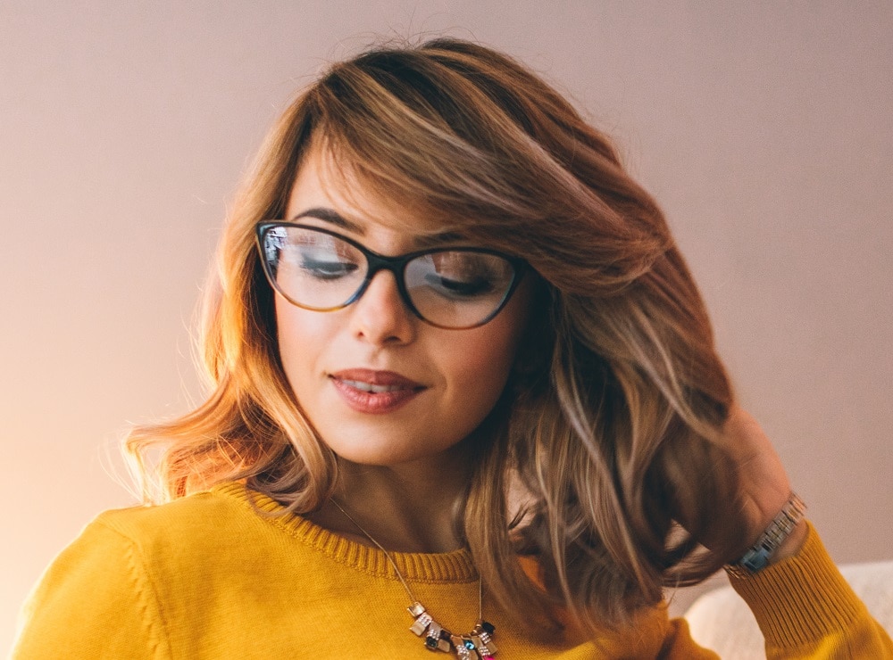 side swept bangs for round faces with glasses