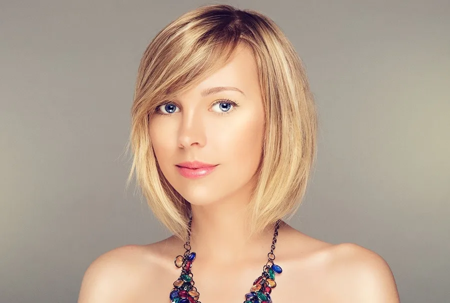 side swept growing out bangs hairstyle