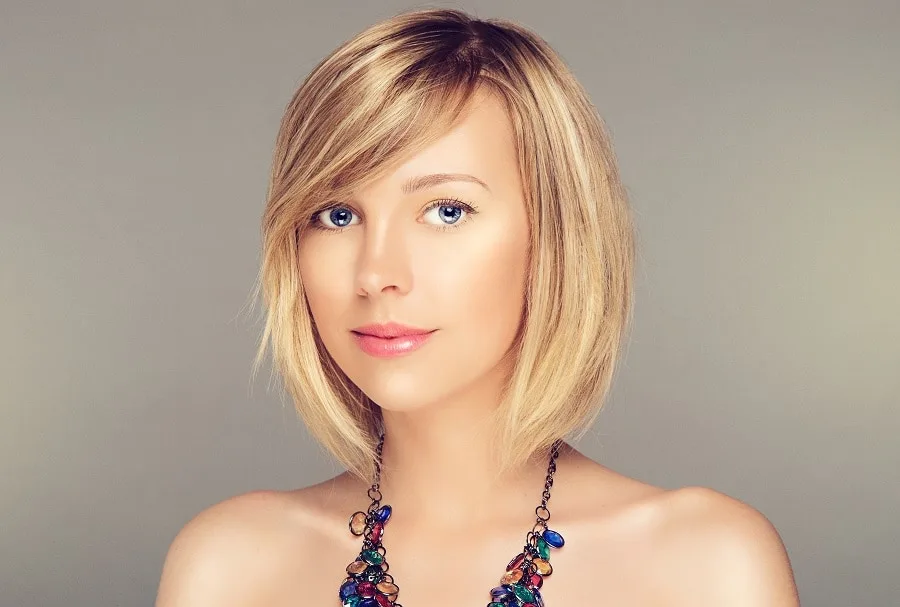 Side Swept Growing Out Bangs Hairstyle .webp