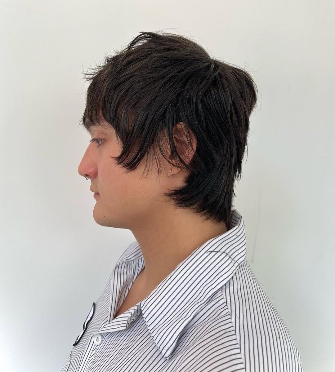 textured skater haircut with choppy front bangs