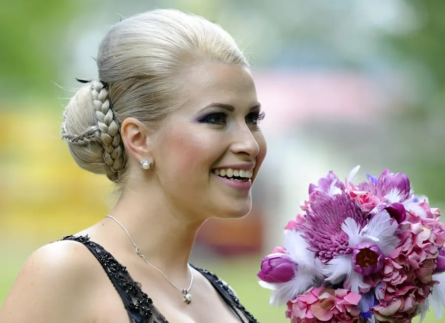 sleek bun hairstyle for bridesmaid with long hair