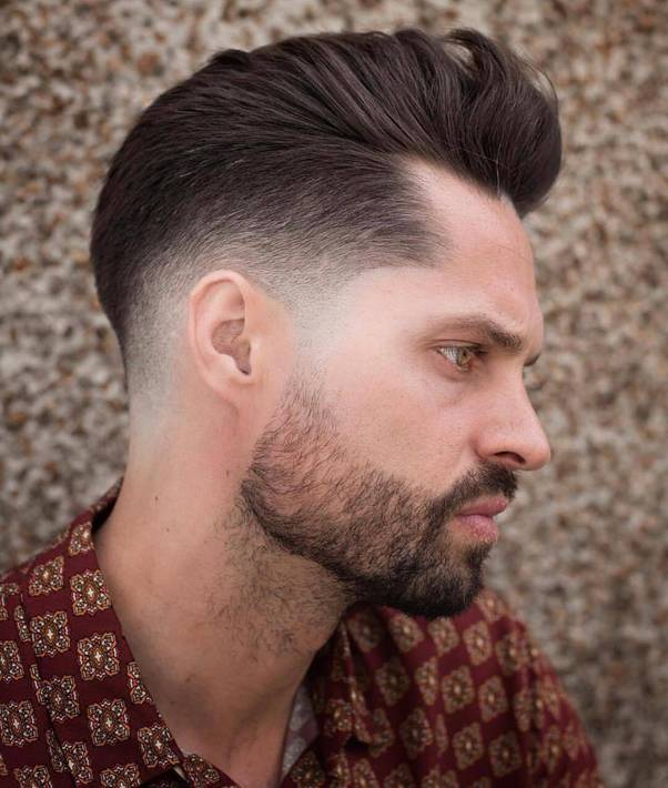 slick back fade for wavy hair