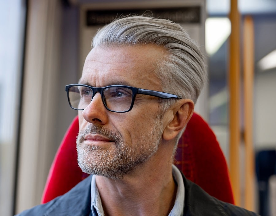 slick back hairstyle for old men with glasses