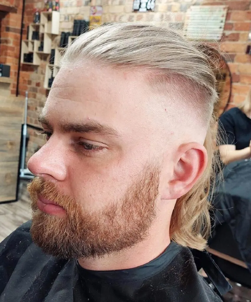 slick back long blonde hair with skin fade