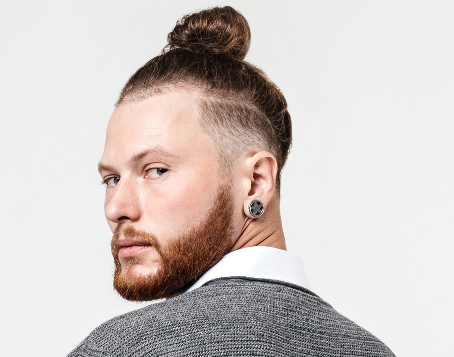 Smooth man bun with shaved sides