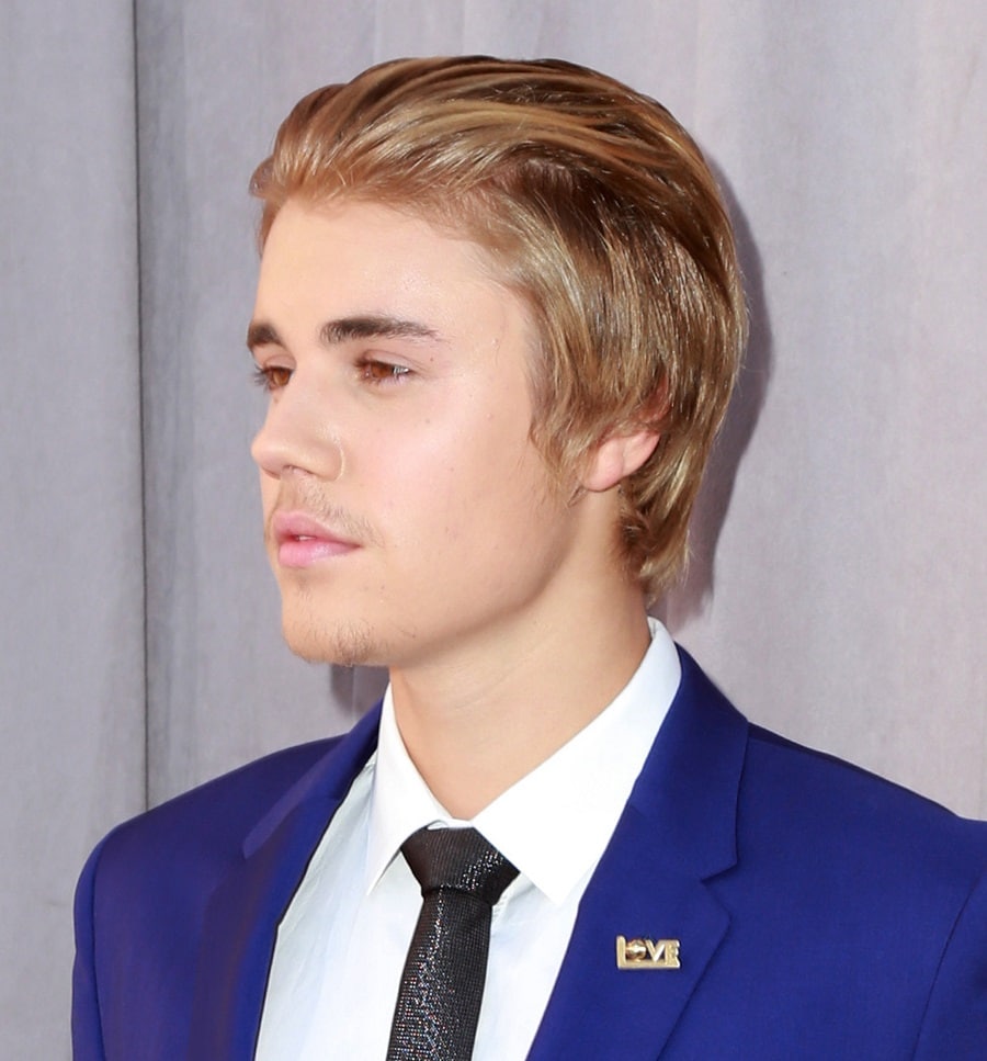 slicked back hairstyle by Justin Bieber