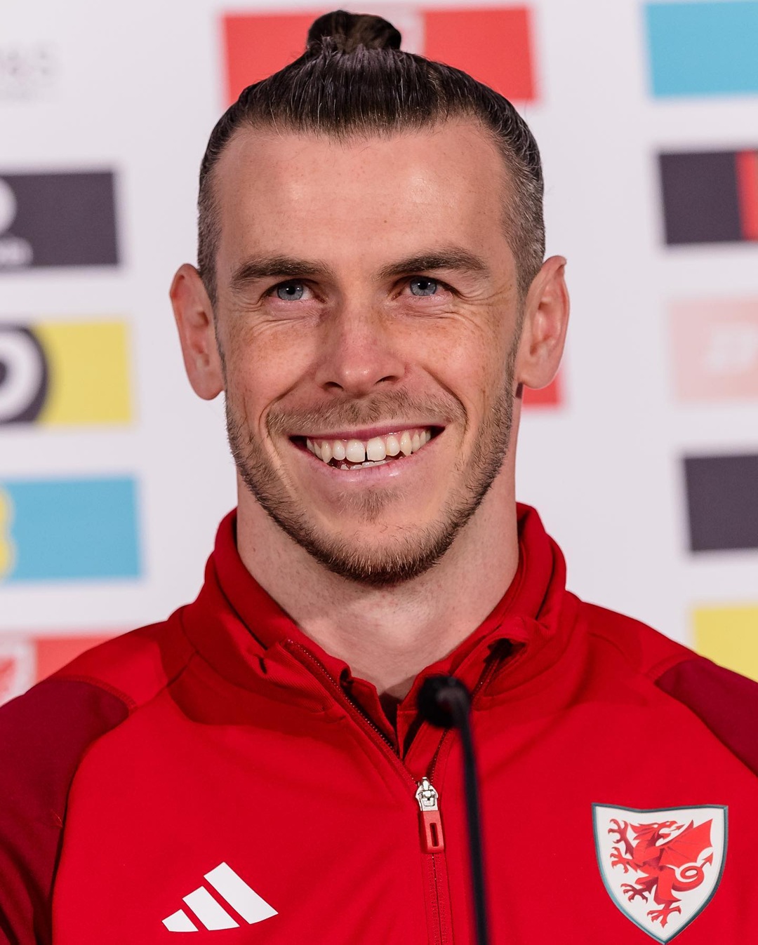 Soccer player Gareth Bale styled in slicked-back high man bun