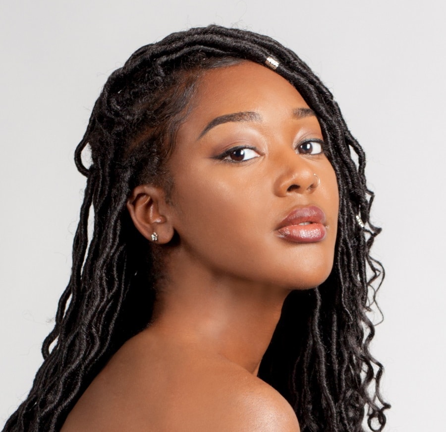 soft locs hairstyle with beads