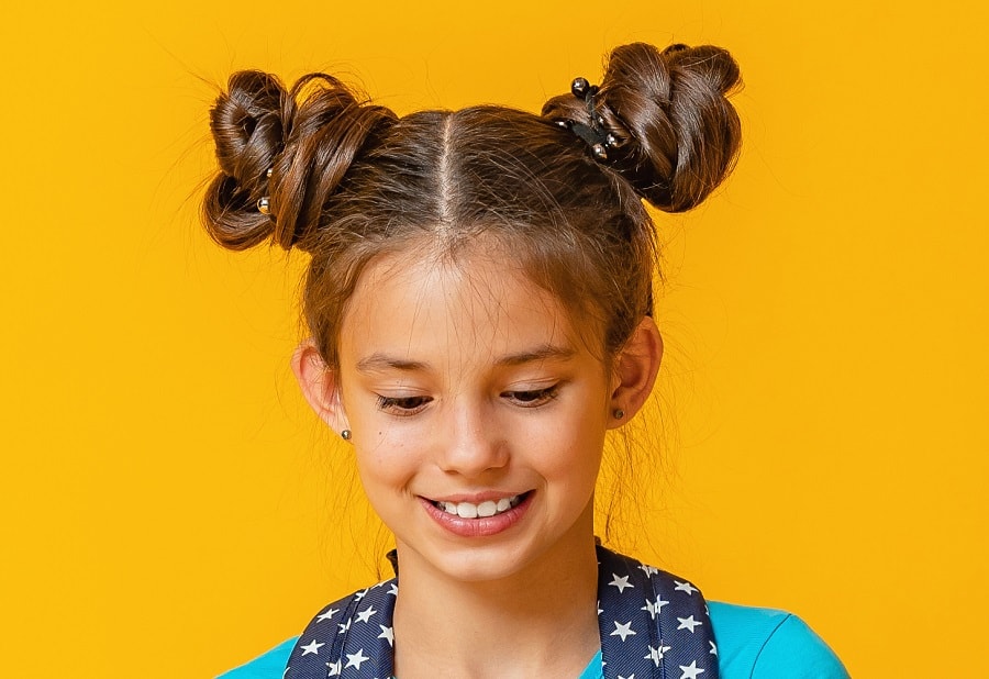 Space bun hairstyle for fourth graders