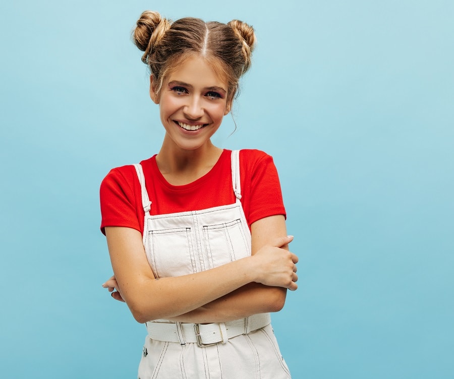 space buns hairstyle for jumpsuit