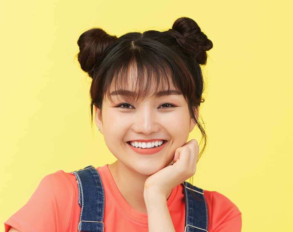 space buns with bangs