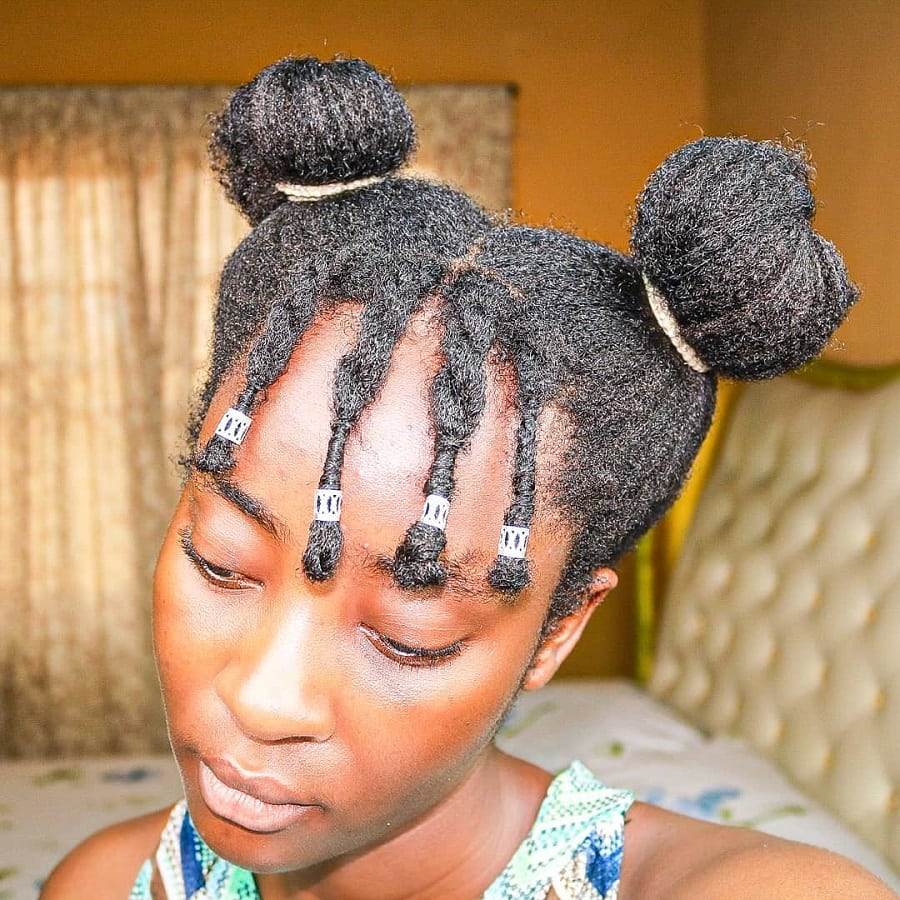 space buns with braided bangs