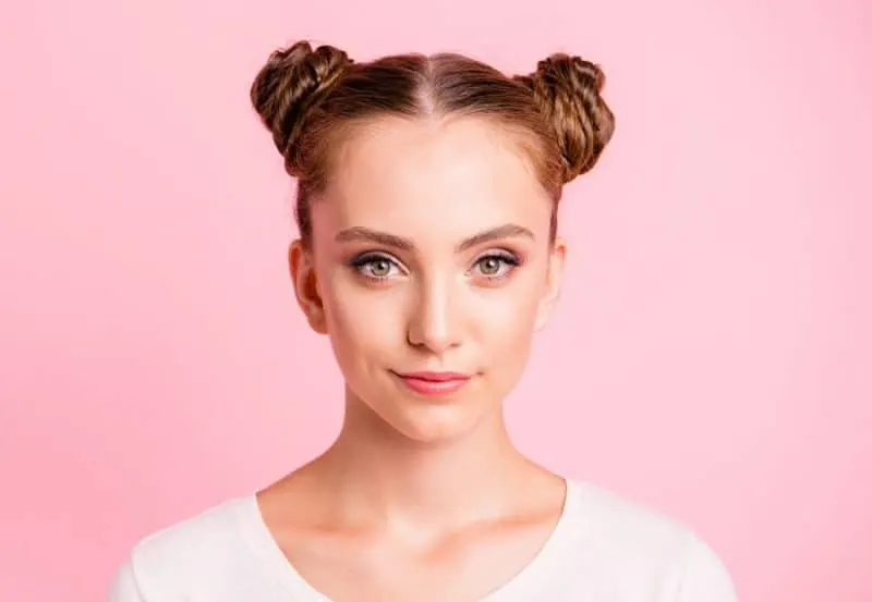 space buns with middle part for women