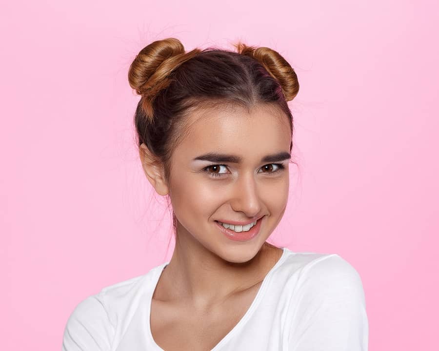 space buns with shoulder length hair