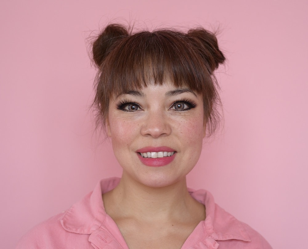 space buns with textured bangs