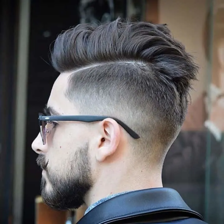 guy with spiky hair and low fade