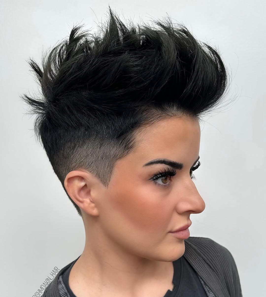 voluminous spiky undercut hairstyle for women