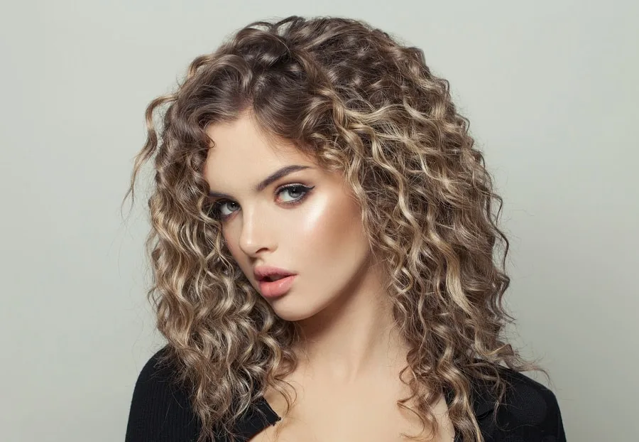 spiral perm on dirty blonde hair