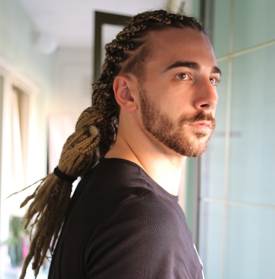 square faced men's braided hairstyle