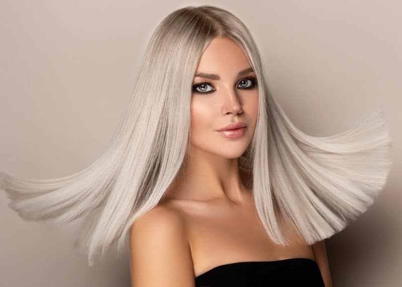 Straight blonde hair with shadow roots