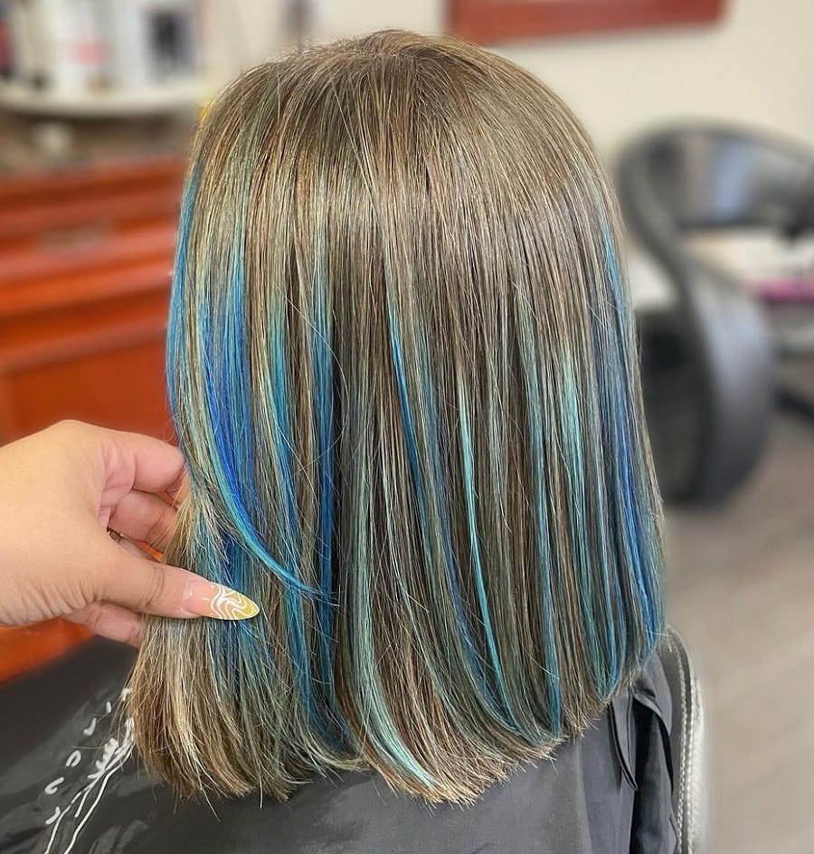 straight dark gray hair with blue highlights