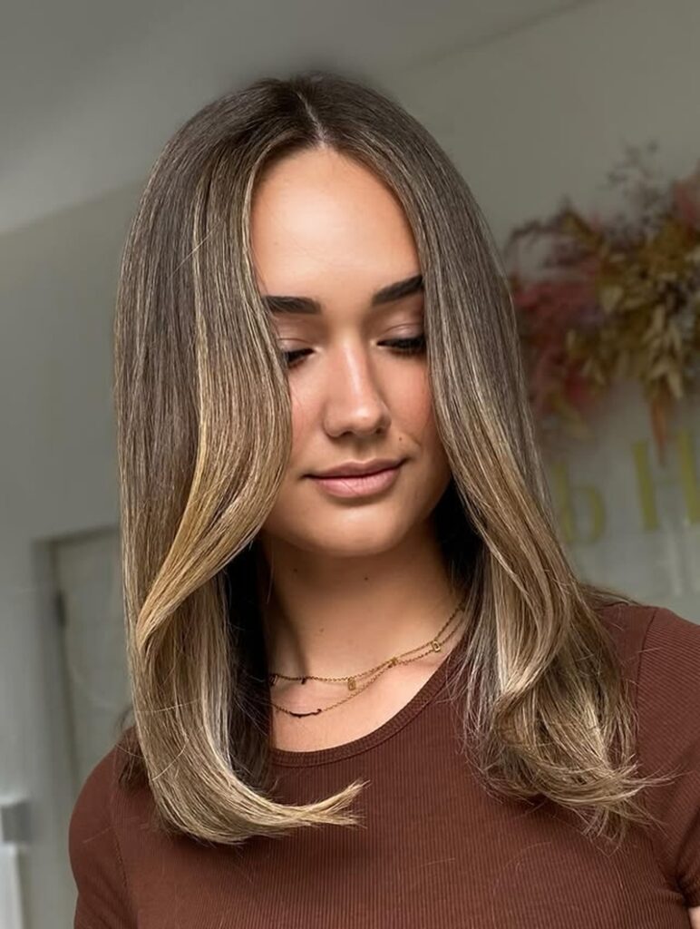sleek medium hair with subtle balayage highlights