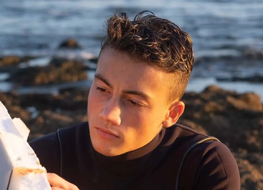 surfer boy hair with undercut