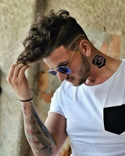 taper fade messy curls for men