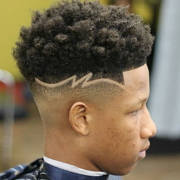 high taper fade with design for men