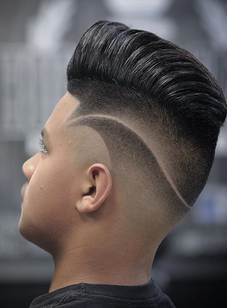 comb over with taper fade and design