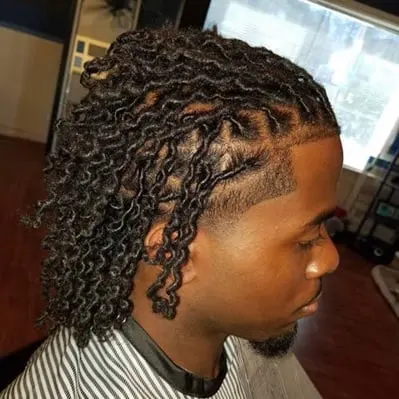 curly dreads with taper fade for men